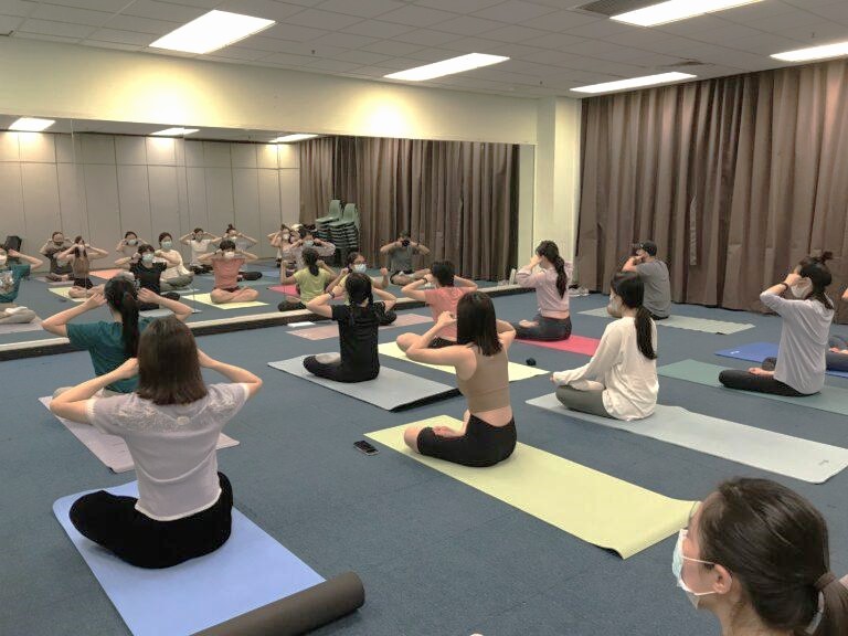 People doing yoga in the studio